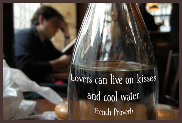 caraffe and cafe tables with quote lovers can exist on kisses and cool water